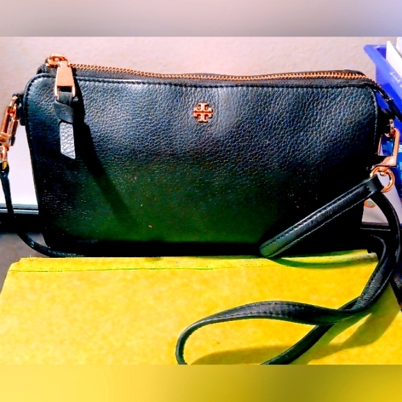 Tory Burch Black Leather Cross body Purse with brass buckle adjustable strap. - Picture 2 of 16